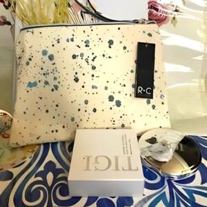 "Elevate Your Beauty: Ruby+Cash Makeup Pouch & TIGI Powder Foundation Duo" 💄✨